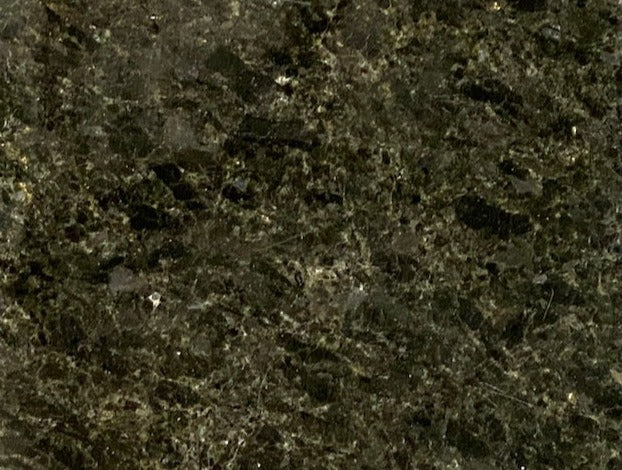 Starry Night - A web of veins glimmers against the deep blue backdrop featuring specks of shimmering opalescent features while providing the durability that granite is known for. The first picture you see is how the stone appears in regular light. The second picture shows how the stone shimmers and reflects it's blue in the light of the sun!