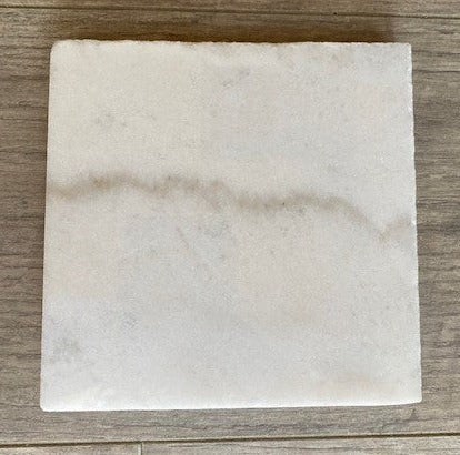 Marmo Grigio Venato: This exquisite natural white marble stone features medium gray and sometimes tan veining on a bright white background.