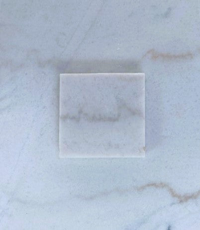 Marmo Grigio Venato: This exquisite natural white marble stone features medium gray and sometimes tan veining on a bright white background.
