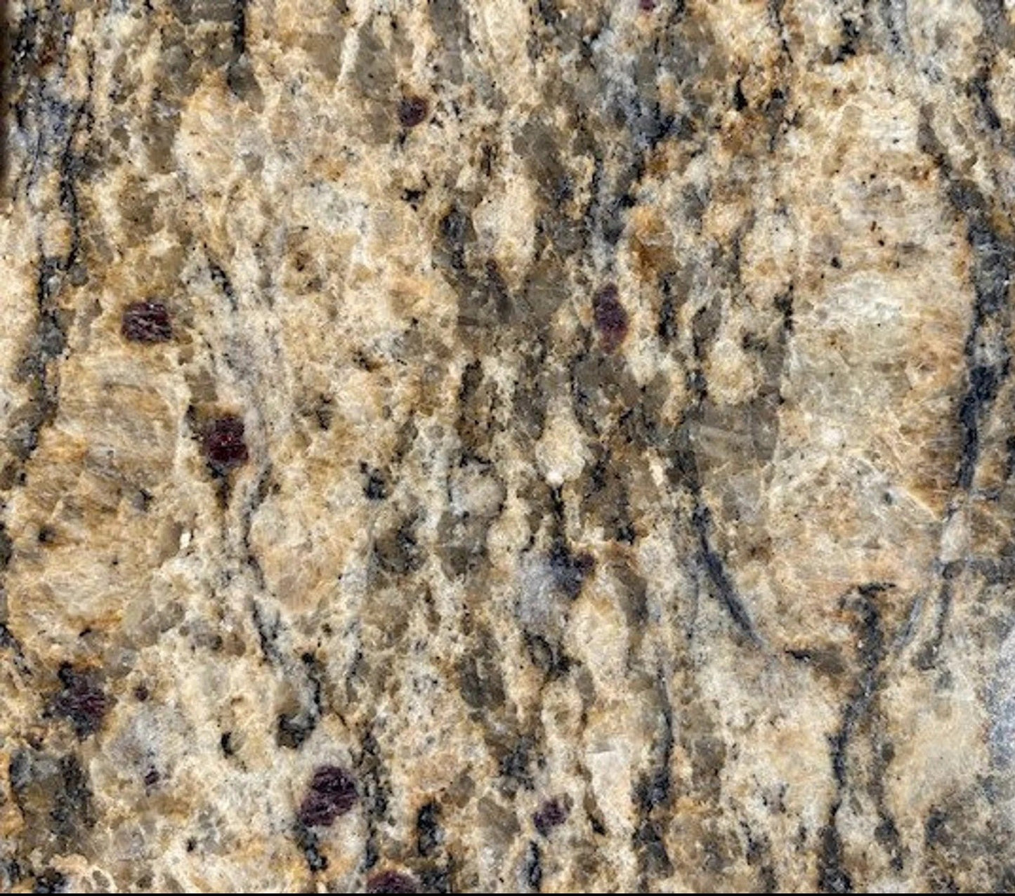 Reminiscent of Pedra da Gávea hues, our Brazilian Bronzed Umber granite is most popular because of it's yellow, gold and black specks. It works will with either light or dark cabinets.