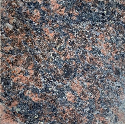Sedona - Capturing the contrast of red mountains against a Sedona blue sky, this granite beautifully reveals its blue and pink crystallization with shimmering white speckles.