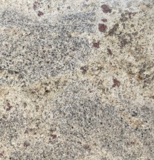 Sivakasi Brown - Subtle and tight patterned, this neutral toned natural granite stone is ideal for backsplashes, fireplaces, and bathrooms.