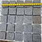 Stormy Granite Cobblestone Pavers - Ideal for driveways, paths and courtyards, these natural surface granite cobbles are non-slip and durable, visit any European city and you will find pavers of a similar material and construction serving their purpose for hundreds of years! Mounted on a plastic mesh for accelerated installation, great for dry or wet setting.