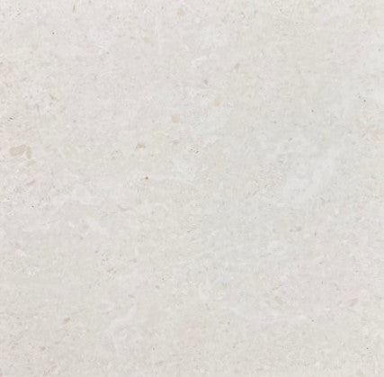 Lavahn Limestone - This impressive white limestone with muted beige calcified mineral features, this is the same genre of natural stone that adorns iconic homes such as Le Petit Trianon in Versailles, France.
