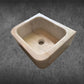 Small Marble Sink: This small white marble sink is carved out from one marble piece and features gray veining. It's perfect for a bathroom or other small space area.